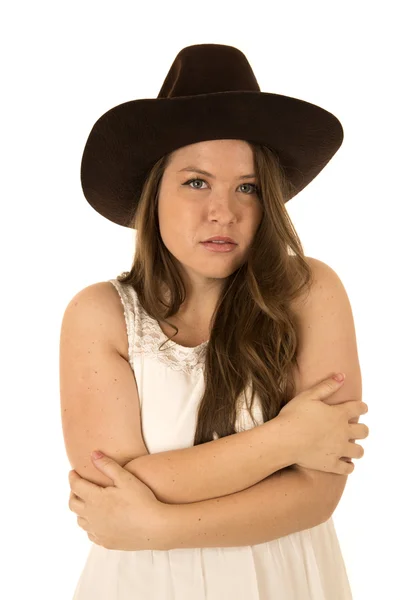 Cowgirl in white dress with good expression and her arms folded — Stock Photo, Image