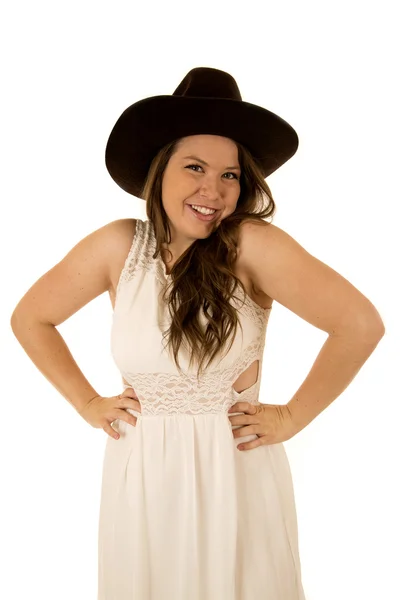 Cute happy cowgirl with her hands on her hips smiling — Stock Photo, Image