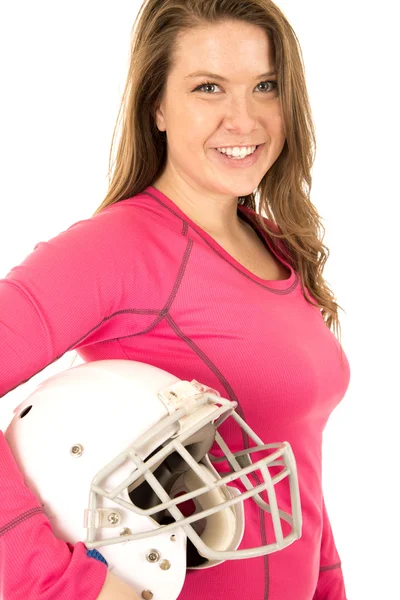 Young brunette female model holding American football helmet — Stock Photo, Image