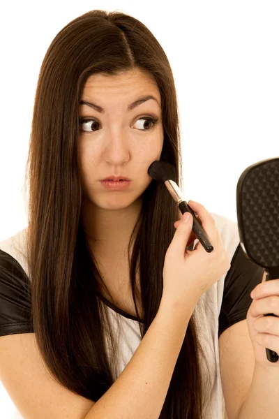 Cute Asian American teen applying blush looking in mirror — Stock Photo, Image