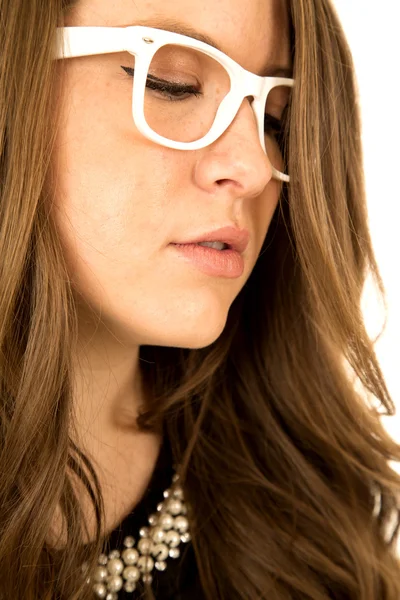 Female model looking down wearing white glasses portrait — Stock Photo, Image