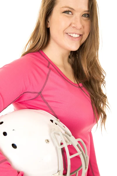 Portrait of a young female model holding an American football he — Stock Photo, Image