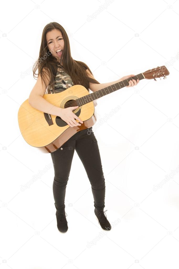 Female model rocking out on an acoustic guitar