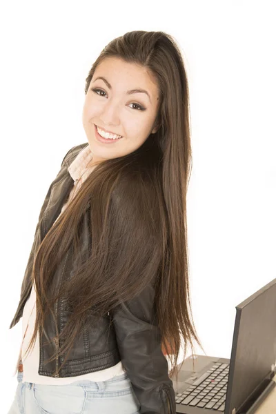 Asian American teen girl posing by her computer — Stock Photo, Image