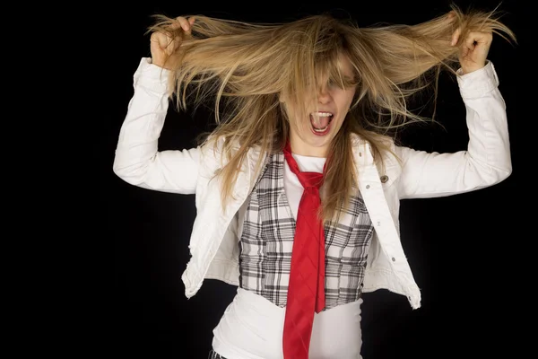 Crazy caucasian young female excited pulling her hair — Stock Photo, Image