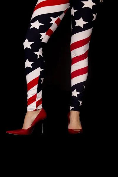 Woman wearing red high heel and flag leggins — Stock Photo, Image