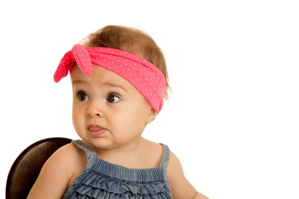 Beautiful baby girl wearing a pink polka-dot headband — Stock Photo, Image