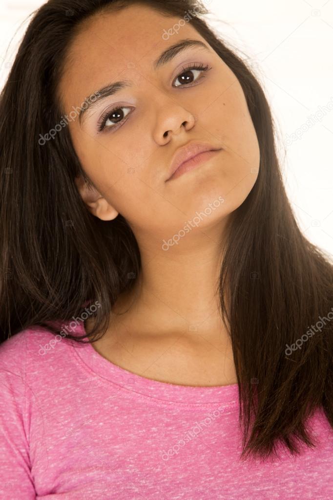Beautiful Hispanic teen girl portrait with her head tilted to on