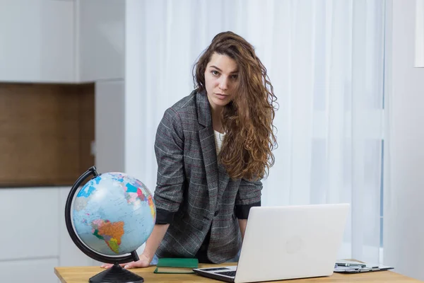 Beautiful woman teaching, teaching online sitting at home