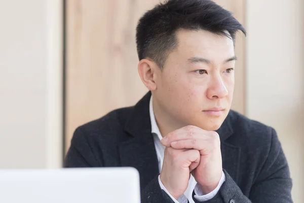 Close Portrait Asian Pensive Young Office Worker Man Workplace Face — Stock Photo, Image