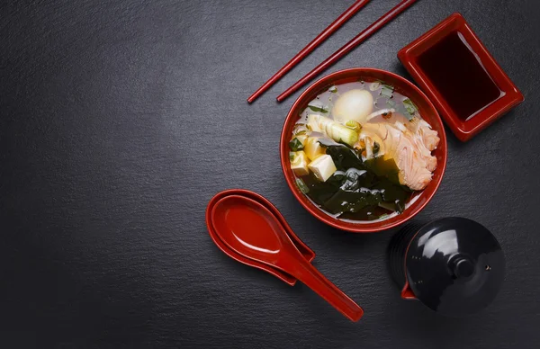 Japanese cuisine. Soup over black background. — Stock Photo, Image