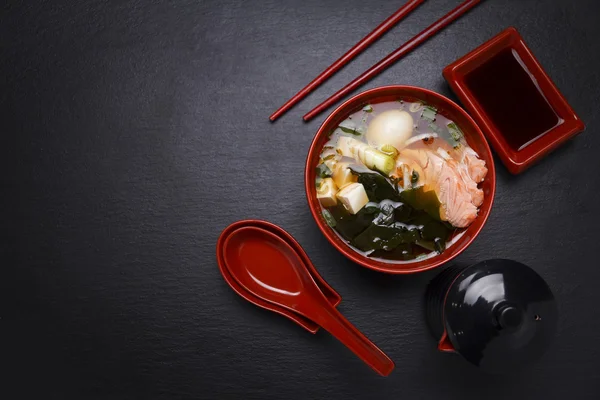 Japanese cuisine. Soup over black background. — Stock Photo, Image