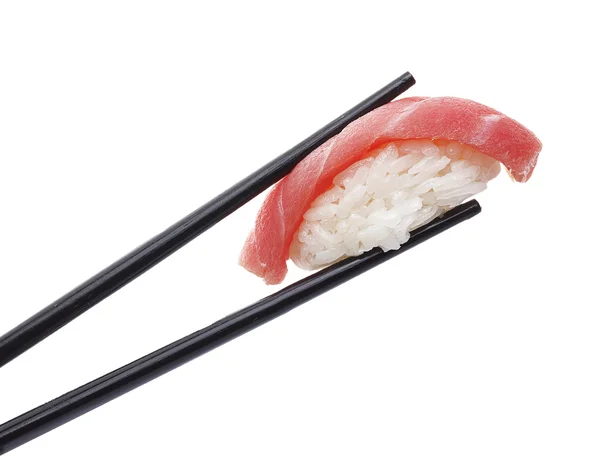 Sushi nigiri in chopsticks isolated on white background — Stock Photo, Image