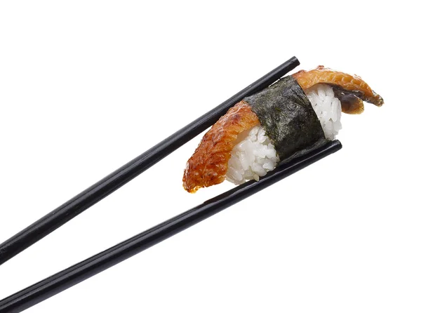 Sushi nigiri in chopsticks isolated on white background — Stock Photo, Image