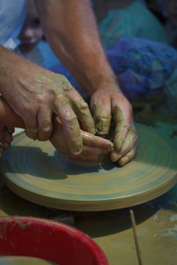 Esnaf. Clay. Potter'ın wheell.