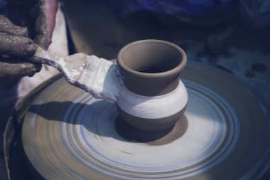 Esnaf. Clay. Potter'ın wheell.
