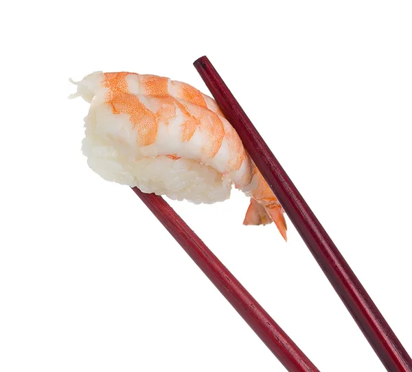 Sushi in chopsticks isolated on white background — Stock Photo, Image