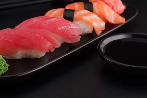 Premium quality sushi over black background — Stock Photo, Image