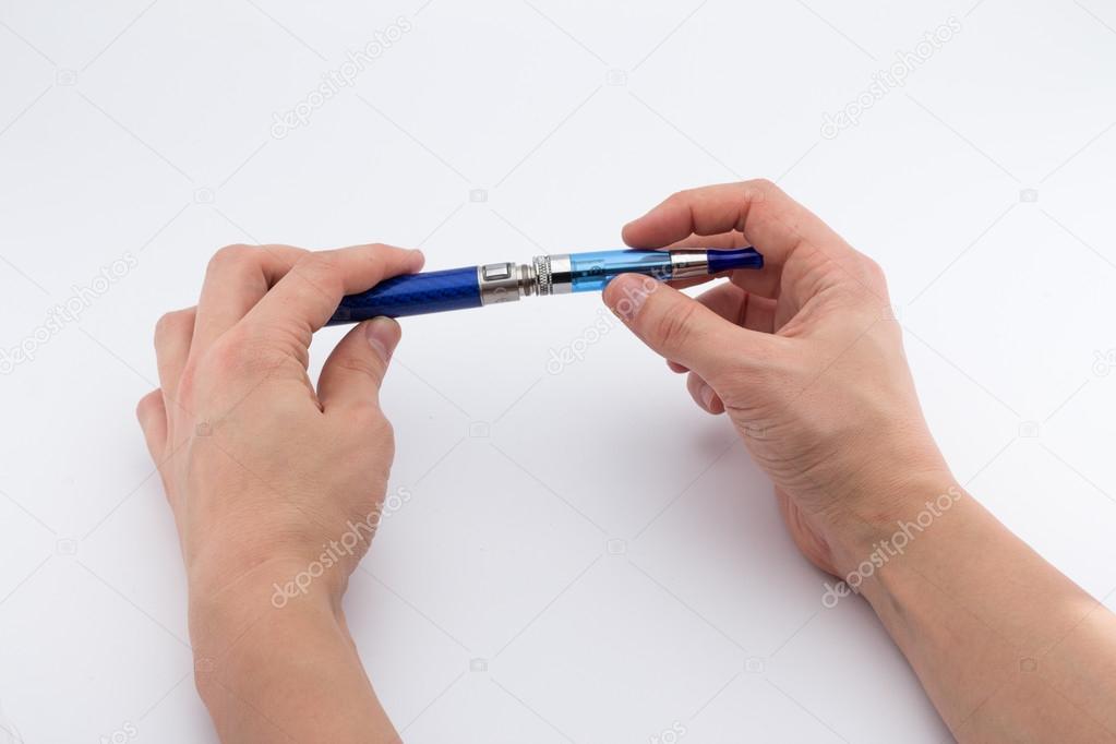 Electronic cigarette over white background