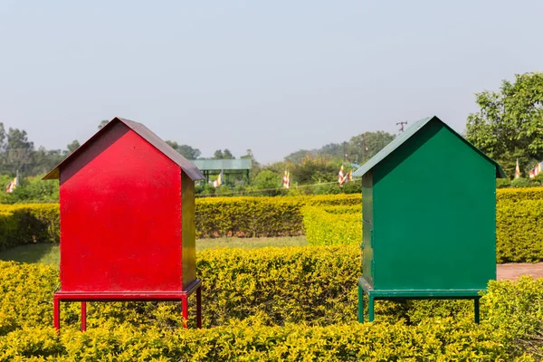 Green and red iron houses. — Stock Photo, Image