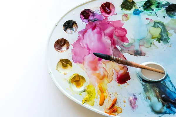 Tavolozza d'arte con macchie di vernice — Foto Stock
