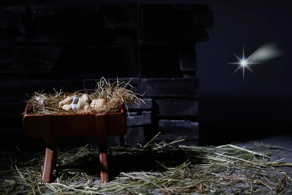 Birth of Jesus. Christmas nativity scene. Manager and star.