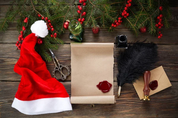 Empty wishlist for Santa Claus on wooden table with Christmas decorations. Top view. — Stock Photo, Image