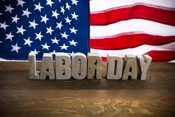 Happy Labor Day banner. USA flag and letters on rustic wooden background. — Stock Photo, Image