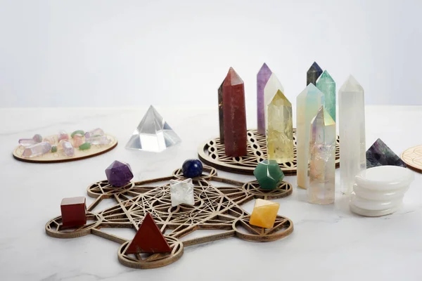 Meditation, reiki and spiritual healing background. Healing crystals grid.