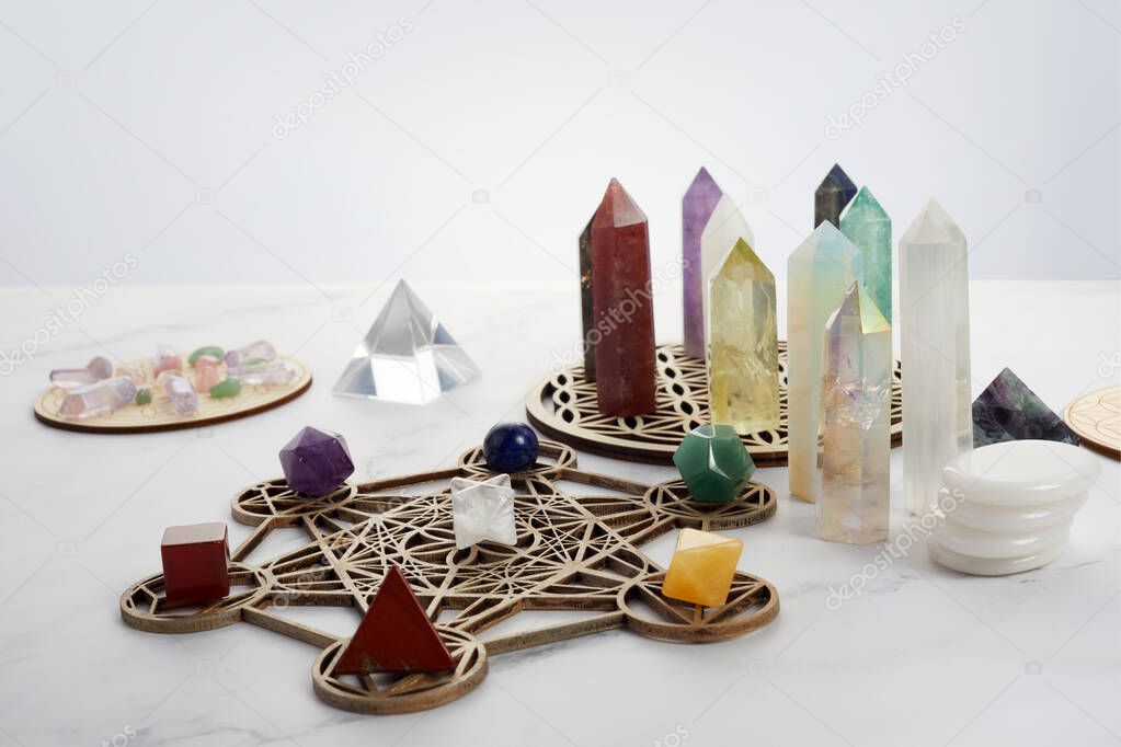 Meditation, reiki and spiritual healing background. Healing crystals grid.