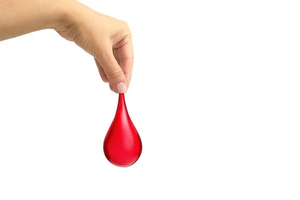 Mão segurando gota de sangue no fundo branco. Doação de sangue, transfusão de sangue, dia mundial do doador de sangue, dia mundial da hemofilia. — Fotografia de Stock