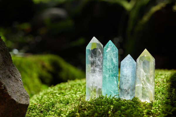 Gemstones minerals on mysterious nature background. Magic Rock for Crystal Ritual, healing spiritual practice.