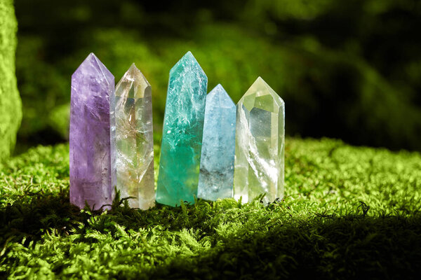 Gemstones minerals on mysterious nature background. Magic Rock for Crystal Ritual, healing spiritual practice.