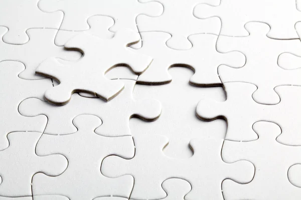 Puzzle white pieces — Stock Photo, Image