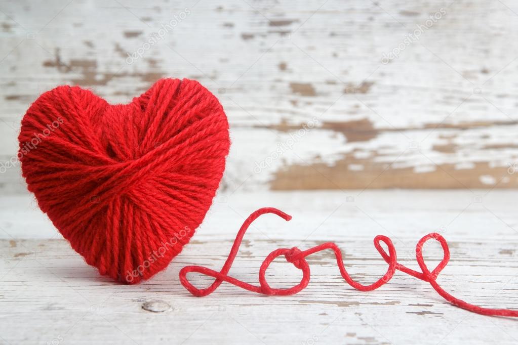 Heart-shaped ball of yarn, with words of love thread