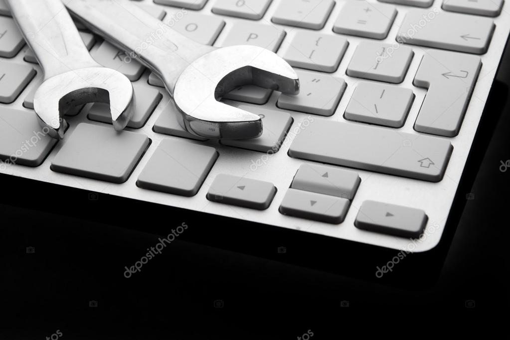 spanners on computer keyboard