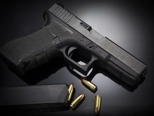 Pistol gun on black background — Stock Photo, Image