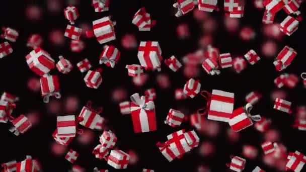 Geschenkschachteln fallen von oben nach unten auf schwarzem Hintergrund mit Schärfentiefe. Leuchtend rot weißer festlicher Hintergrund. — Stockvideo