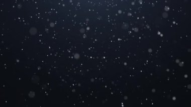Koyu mavi arka planda pürüzsüz döngüsü olan gerçekçi kar yağışı animasyonu.