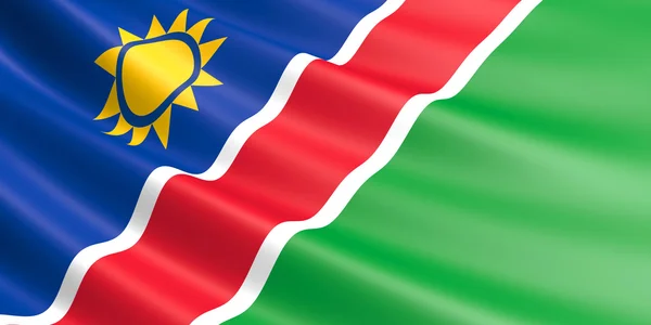 Vlag van Namibië zwaaien in de wind. — Stockfoto