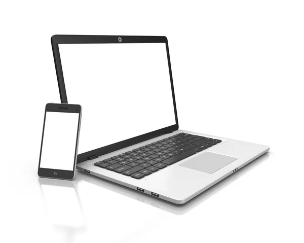 Moderní notebook a smartphone izolovaných na bílém. — Stock fotografie