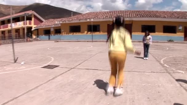 Schoolgirls playing in the schoolyard — Stock Video