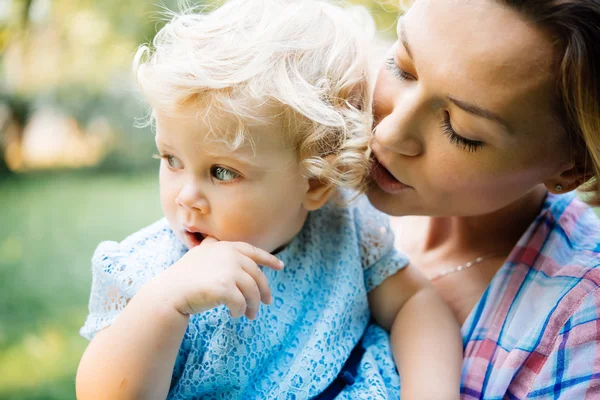 Mother and daughter during a walk outdoors — Stock Photo, Image