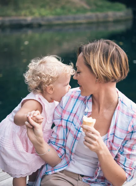 Mother and daughter during a walk outdoors — Stock Photo, Image