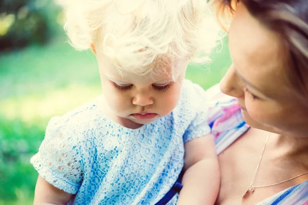 Mother and daughter during a walk outdoors — Stock Photo, Image