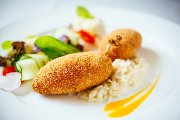 Chicken Kiev with risotto — Stock Photo, Image