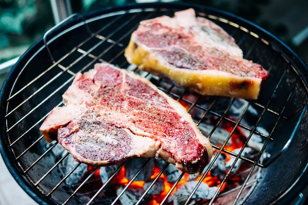 Beef steaks on the grill — Stock Photo, Image