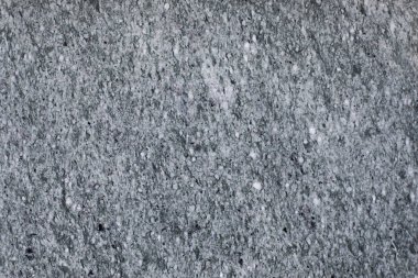 Beyaz noktalı gri mermer yüzey, doğal taştan fon tasarımı.