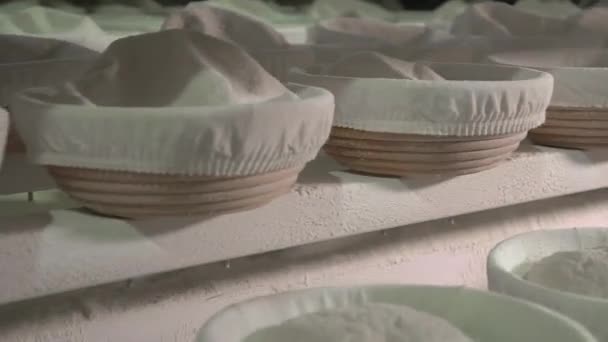 Bread baskets move on a conveyor belt — Stock Video