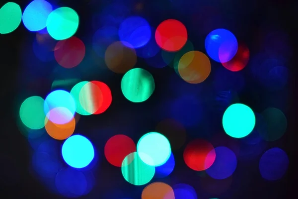 Kleur Abstracte Blurred Achtergrond Bokeh Kerstverlichting Een Pure Zwarte Achtergrond — Stockfoto